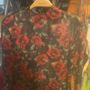 Listing for Kim Sheer black top with roses